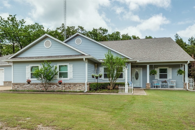 view of front of property with a front lawn and covered porch