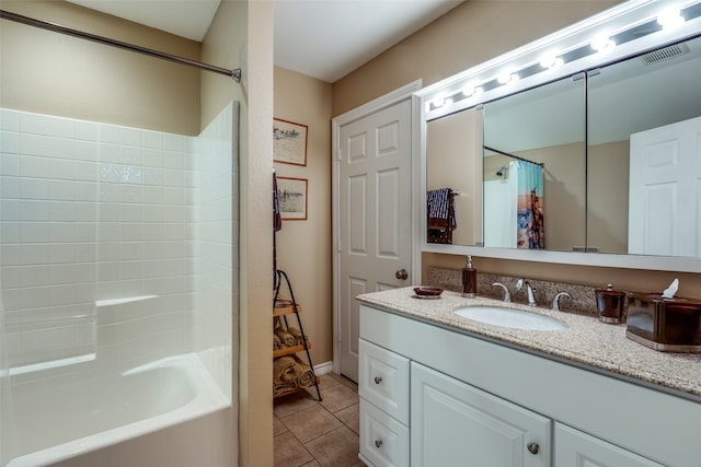 bathroom featuring tile floors, shower / bath combination with curtain, and vanity