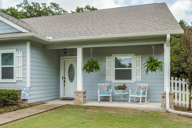 entrance to property with a porch