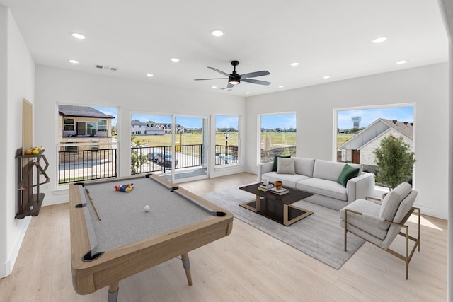 recreation room with ceiling fan, light wood-type flooring, and pool table