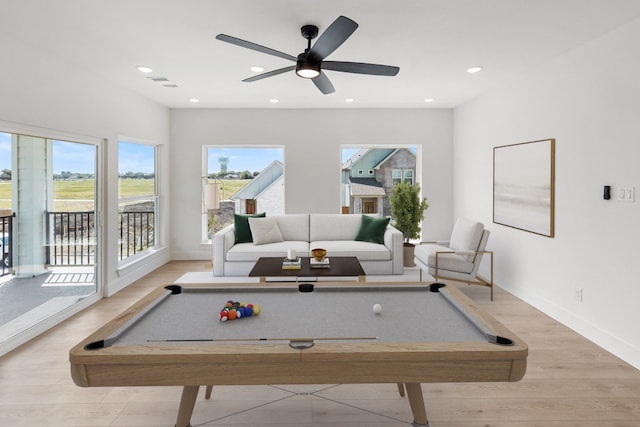 game room featuring ceiling fan, light hardwood / wood-style flooring, and billiards