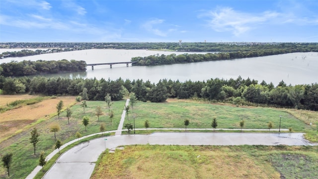 bird's eye view with a rural view and a water view