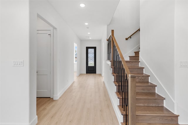 foyer with light hardwood / wood-style flooring