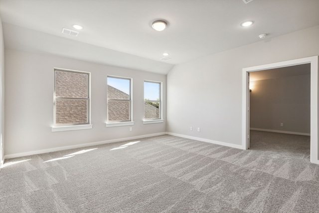 spare room with light colored carpet