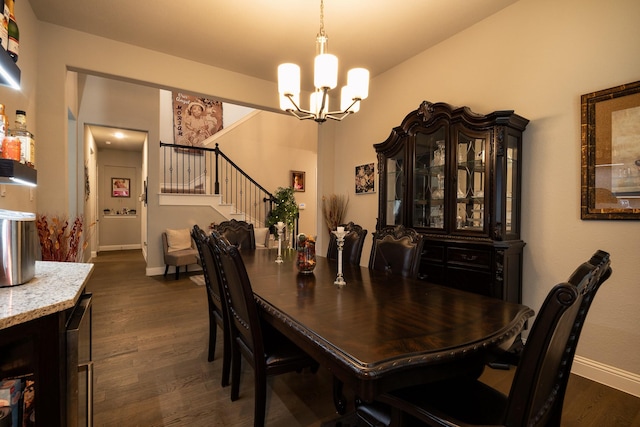 dining area with an inviting chandelier, stairs, baseboards, and dark wood-style flooring