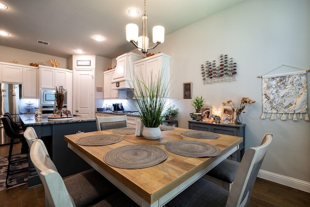 dining space featuring baseboards, visible vents, dark wood finished floors, a notable chandelier, and recessed lighting