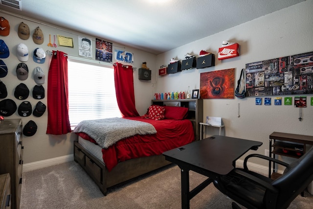 bedroom with baseboards, visible vents, and carpet flooring