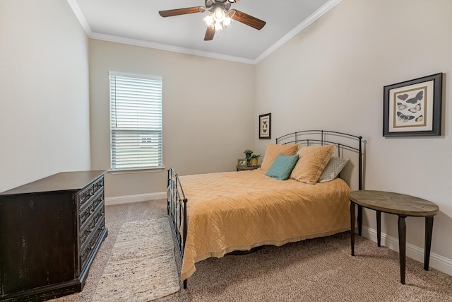 bedroom with carpet flooring, ceiling fan, and crown molding