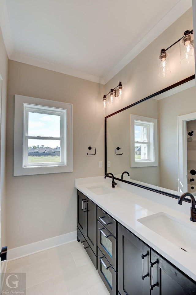 bathroom featuring vanity and ornamental molding