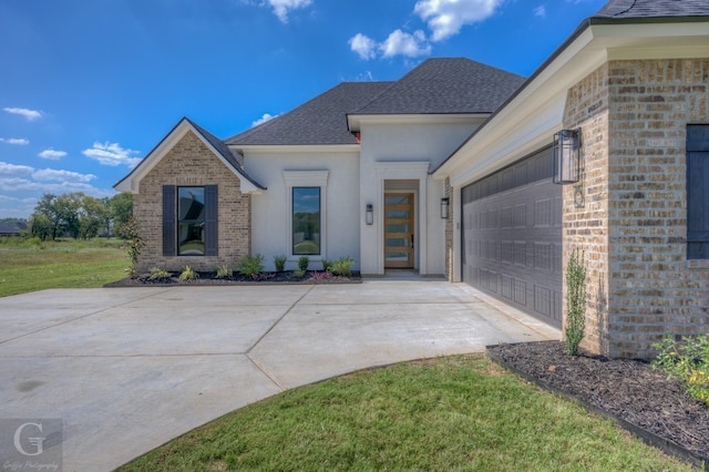 view of front of home featuring a garage