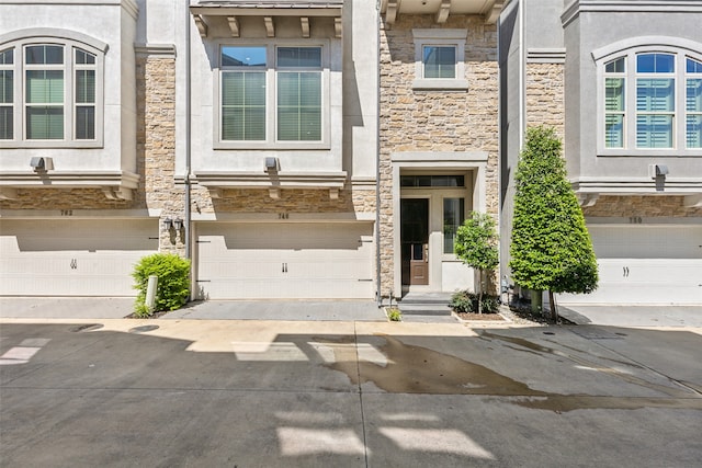 view of front of property with a garage