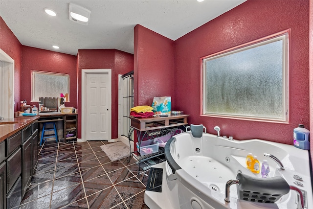 bathroom featuring tile flooring and vanity