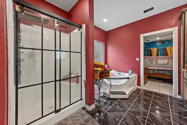 bathroom featuring tile floors and a shower with shower door