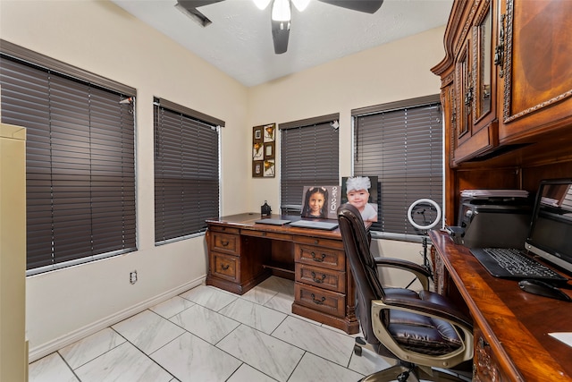 tiled office space with ceiling fan