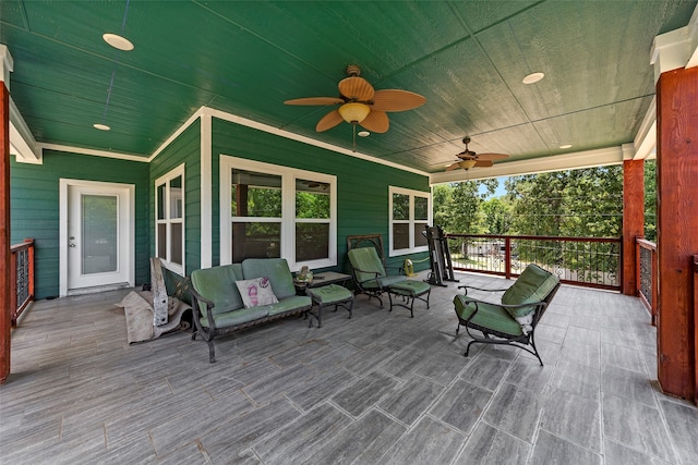 wooden terrace featuring ceiling fan