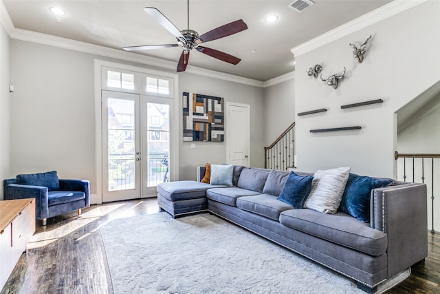 living room with ornamental molding, ceiling fan, french doors, and hardwood / wood-style flooring