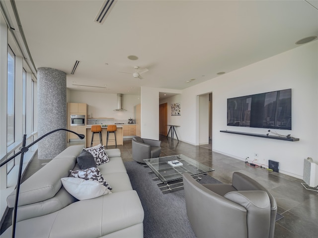 living room featuring ceiling fan