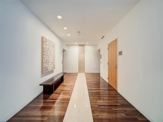 hallway featuring tile patterned floors