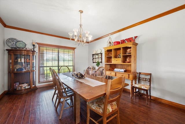 dining space featuring dark hardwood / wood-style floors, an inviting chandelier, and crown molding