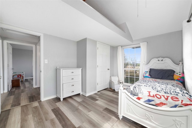 bedroom with wood-type flooring