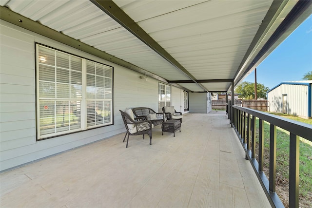 view of patio featuring an outdoor structure