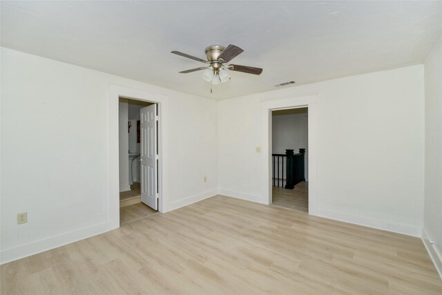 spare room with ceiling fan and light hardwood / wood-style flooring