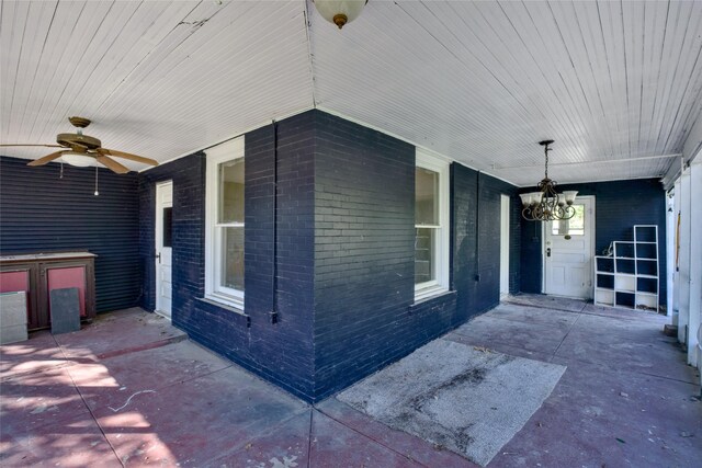 view of patio / terrace with ceiling fan and a porch