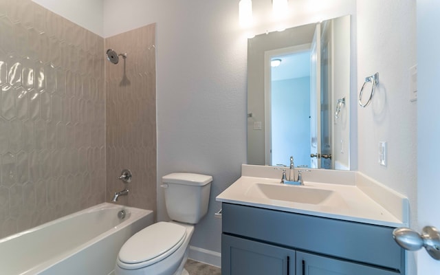 full bathroom featuring vanity, tiled shower / bath combo, and toilet