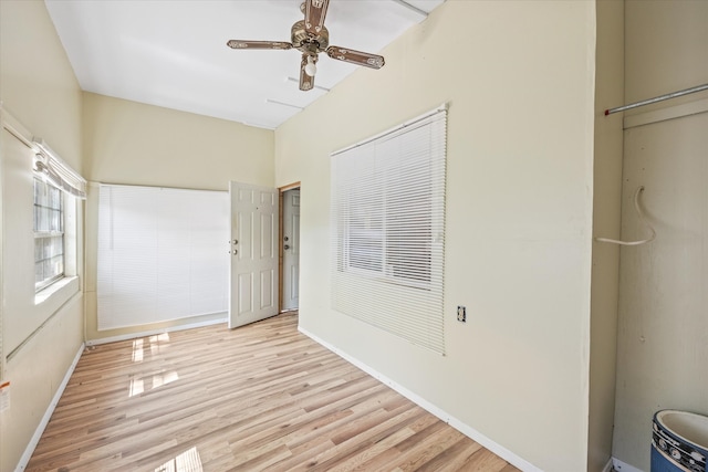 interior space with light wood-type flooring and ceiling fan