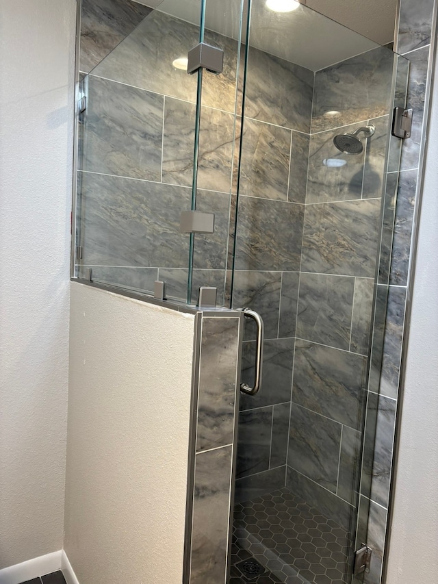 bathroom with an enclosed shower