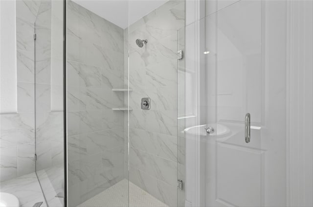 bathroom with an enclosed shower