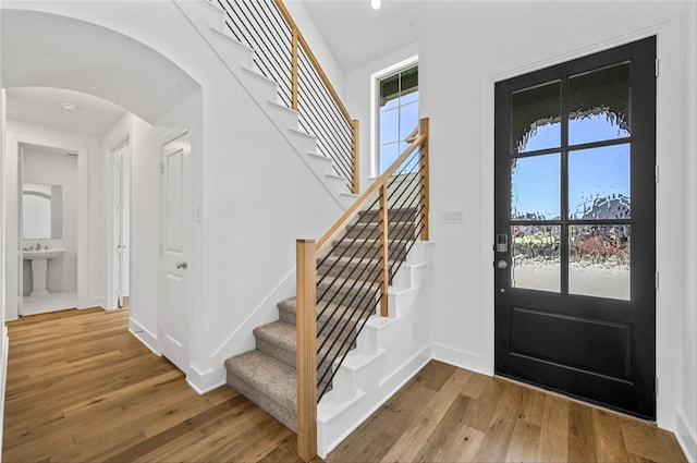 foyer entrance featuring hardwood / wood-style floors