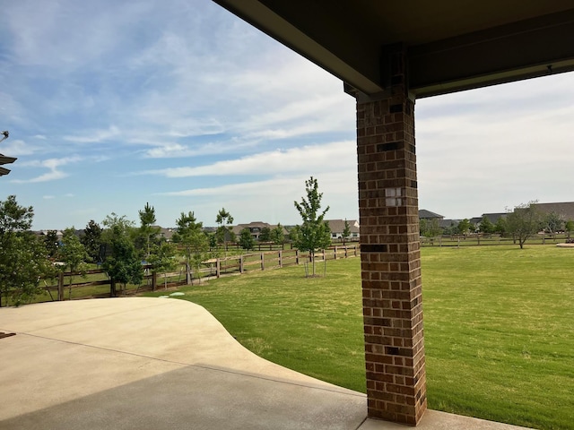 view of community with a patio area and a yard