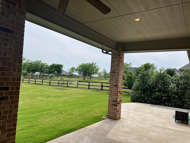 view of patio / terrace featuring ceiling fan