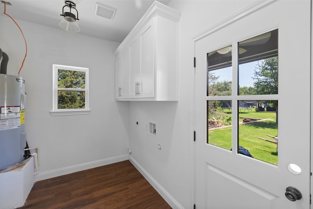 laundry area featuring cabinets, electric water heater, hookup for a gas dryer, hookup for an electric dryer, and dark hardwood / wood-style flooring