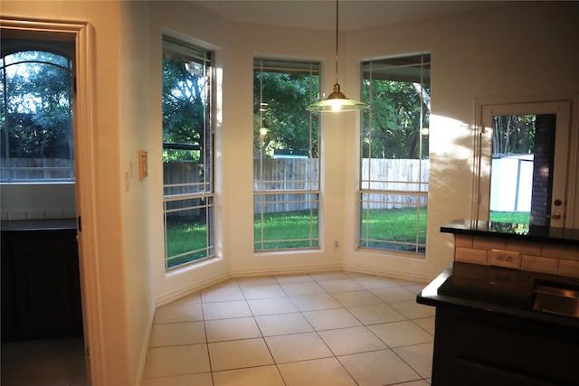 dining area featuring tile floors