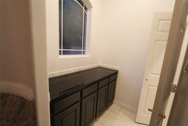 bathroom featuring tile floors