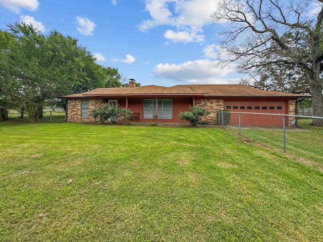 ranch-style house featuring a front lawn