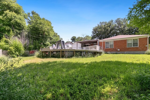 view of yard featuring a deck