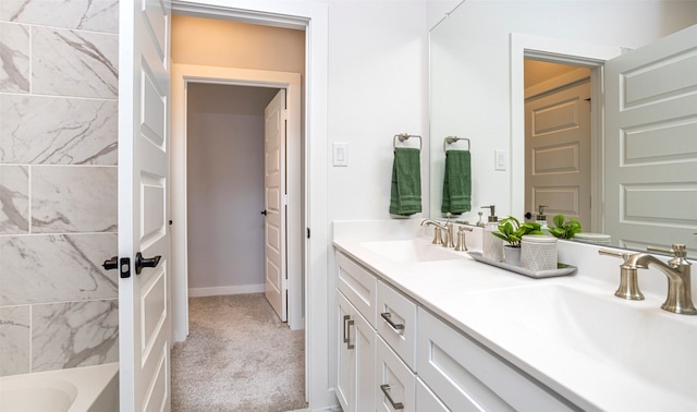 bathroom featuring double vanity