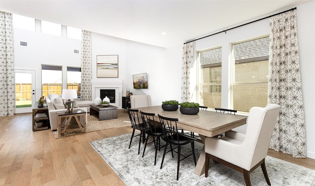 dining area featuring light wood-type flooring