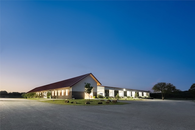 ranch-style house with a lawn