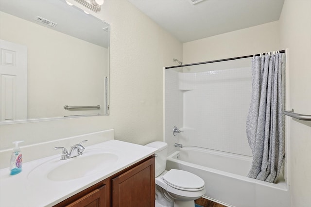 full bathroom featuring vanity, toilet, and shower / tub combo with curtain