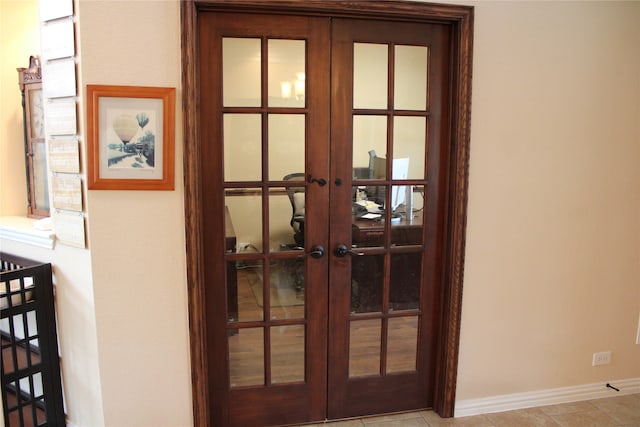 room details featuring french doors and tile patterned flooring