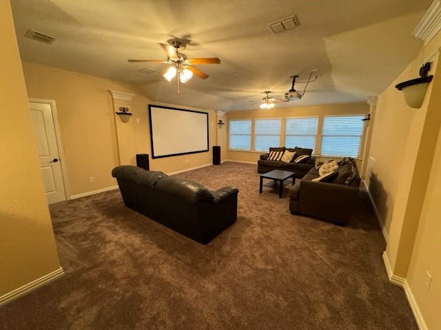 living room featuring dark carpet and ceiling fan