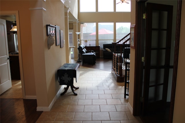 corridor with hardwood / wood-style floors