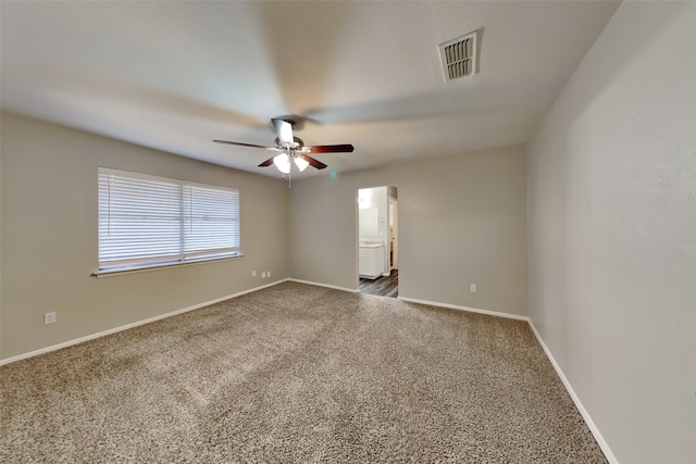 carpeted empty room with ceiling fan