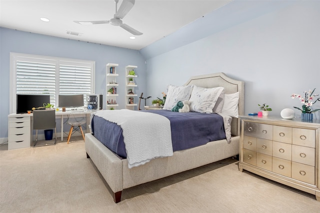 bedroom featuring ceiling fan, light carpet, and lofted ceiling