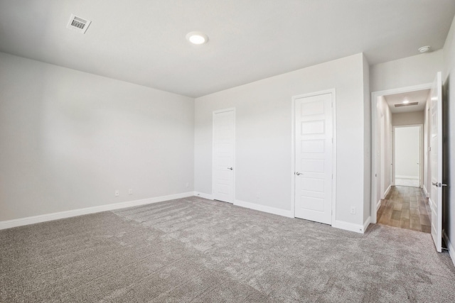 unfurnished bedroom with carpet flooring