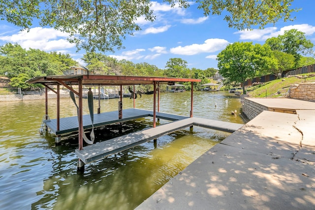 view of dock with a water view